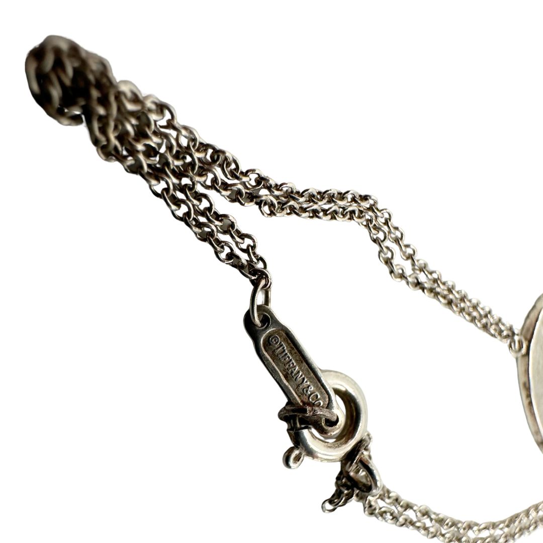  Bracciale Tiffany&Co. della collezione Return To Tiffany in argento 925 con ciondolo cuore, di lusso, originale, ottime condizioni.