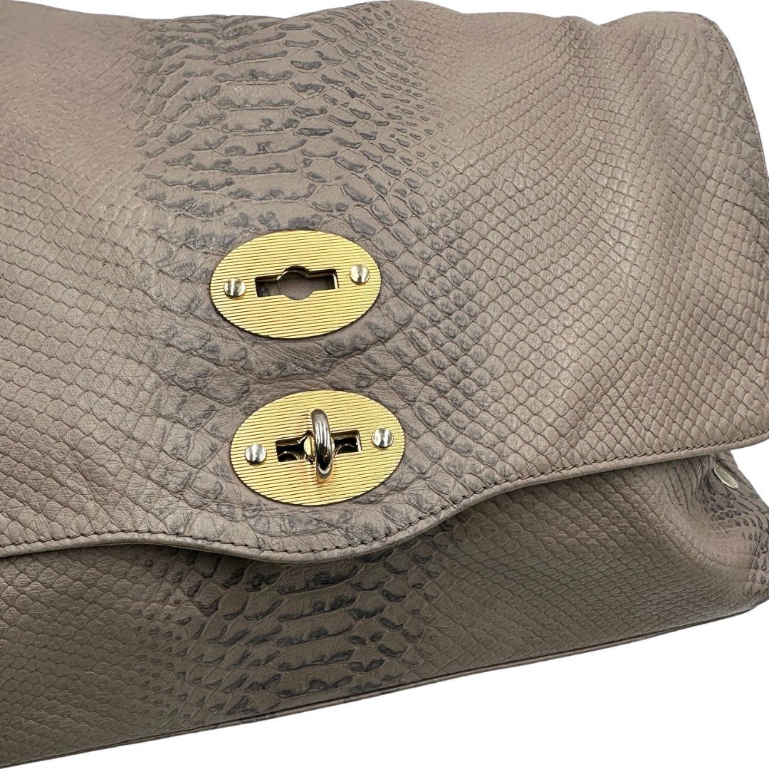 chiusura Postina Zanellato nella versione media impreziosita da trama animalier, di lusso, originale, ottime condizioni, usata. 