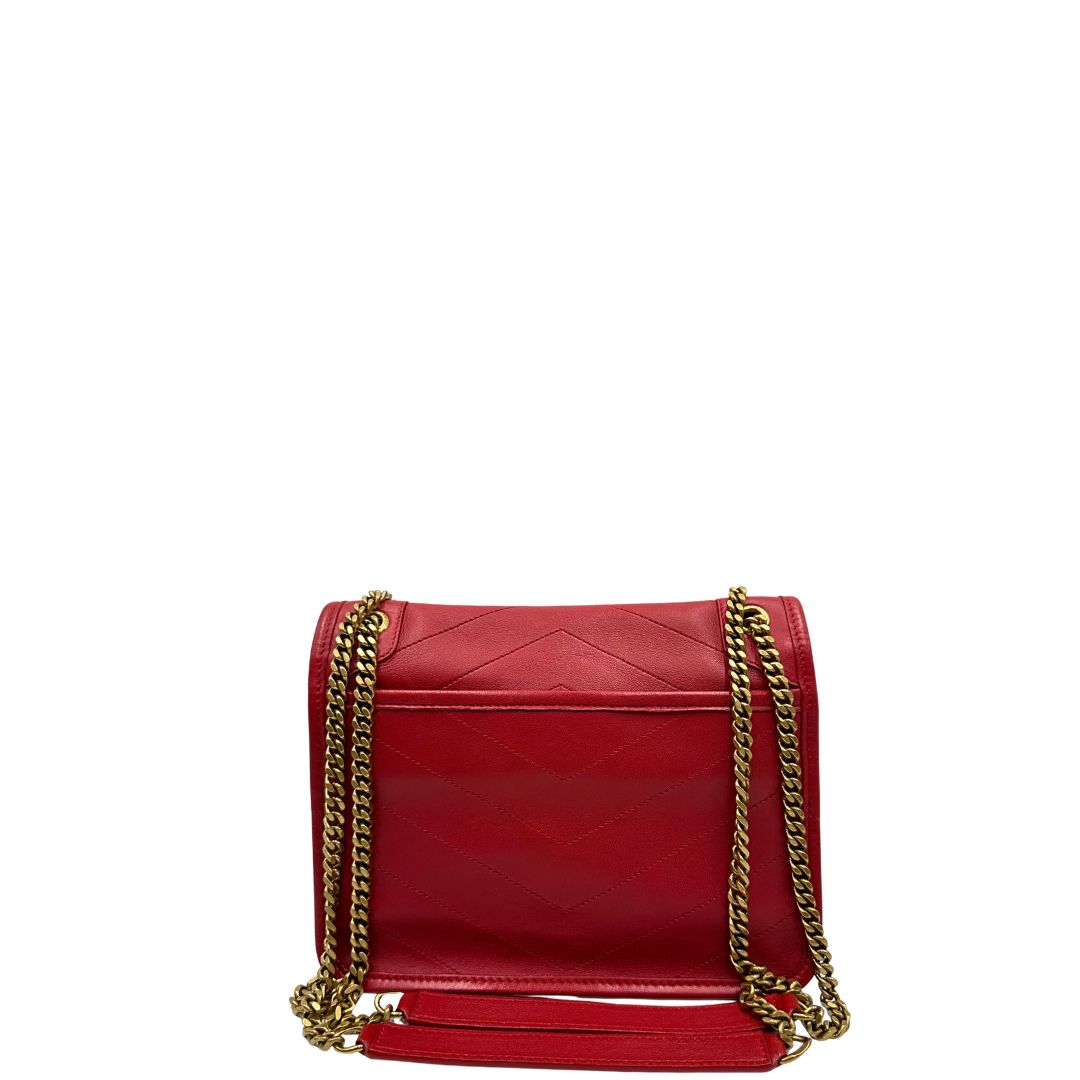 retro  Borsa Niki Saint Laurent rossa nella versione baby, di lusso, originale, ottime condizioni, usata. 