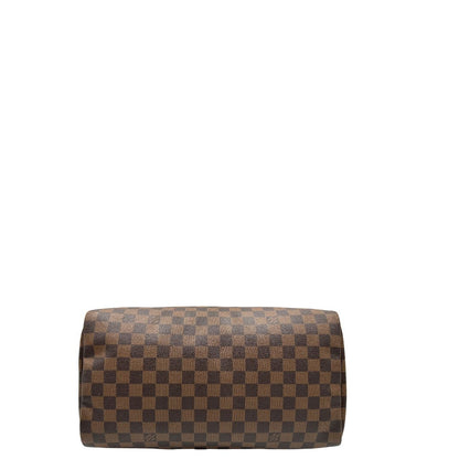Base, Louis Vuitton Speedy in tela Damier Ébène marrone e hardware dorato. Originale, usato, di lusso, in buone condizioni.
