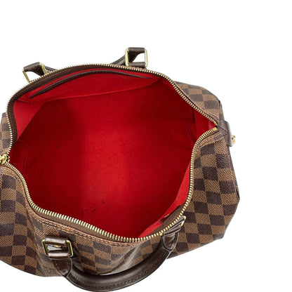 Interno, Louis Vuitton Speedy in tela Damier Ébène marrone e hardware dorato. Originale, usato, di lusso, in buone condizioni.