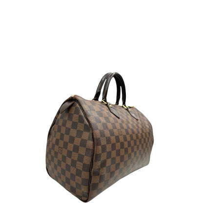 Lato destro, Louis Vuitton Speedy in tela Damier Ébène marrone e hardware dorato. Originale, usato, di lusso, in buone condizioni.