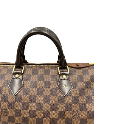 Manici, Louis Vuitton Speedy in tela Damier Ébène marrone e hardware dorato. Originale, usato, di lusso, in buone condizioni.