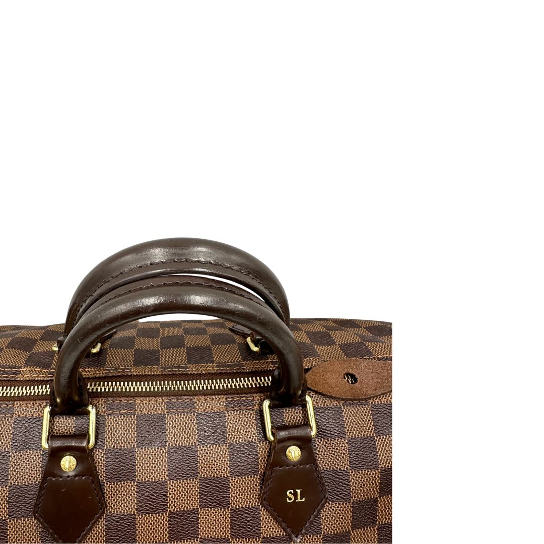Manici, Louis Vuitton Speedy in tela Damier Ébène marrone e hardware dorato. Originale, usato, di lusso, in buone condizioni.