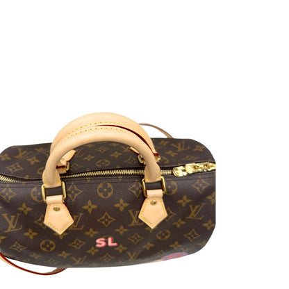 Manici, Borsa Louis Vuitton realizzata in tela monogram marrone con finiture in vacchetta naturale. Originale, usata, di lusso, in condizioni eccellenti.