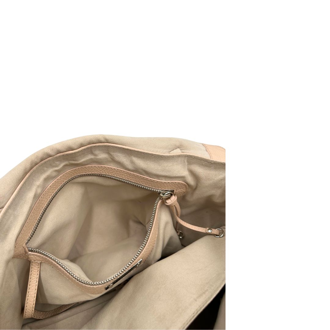 Tasca interna, Morbida Zanellato in pelle martellata rosa nella misura media.