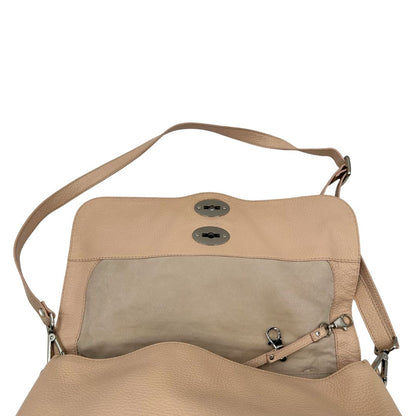 Interno, Morbida Zanellato in pelle martellata rosa nella misura media.