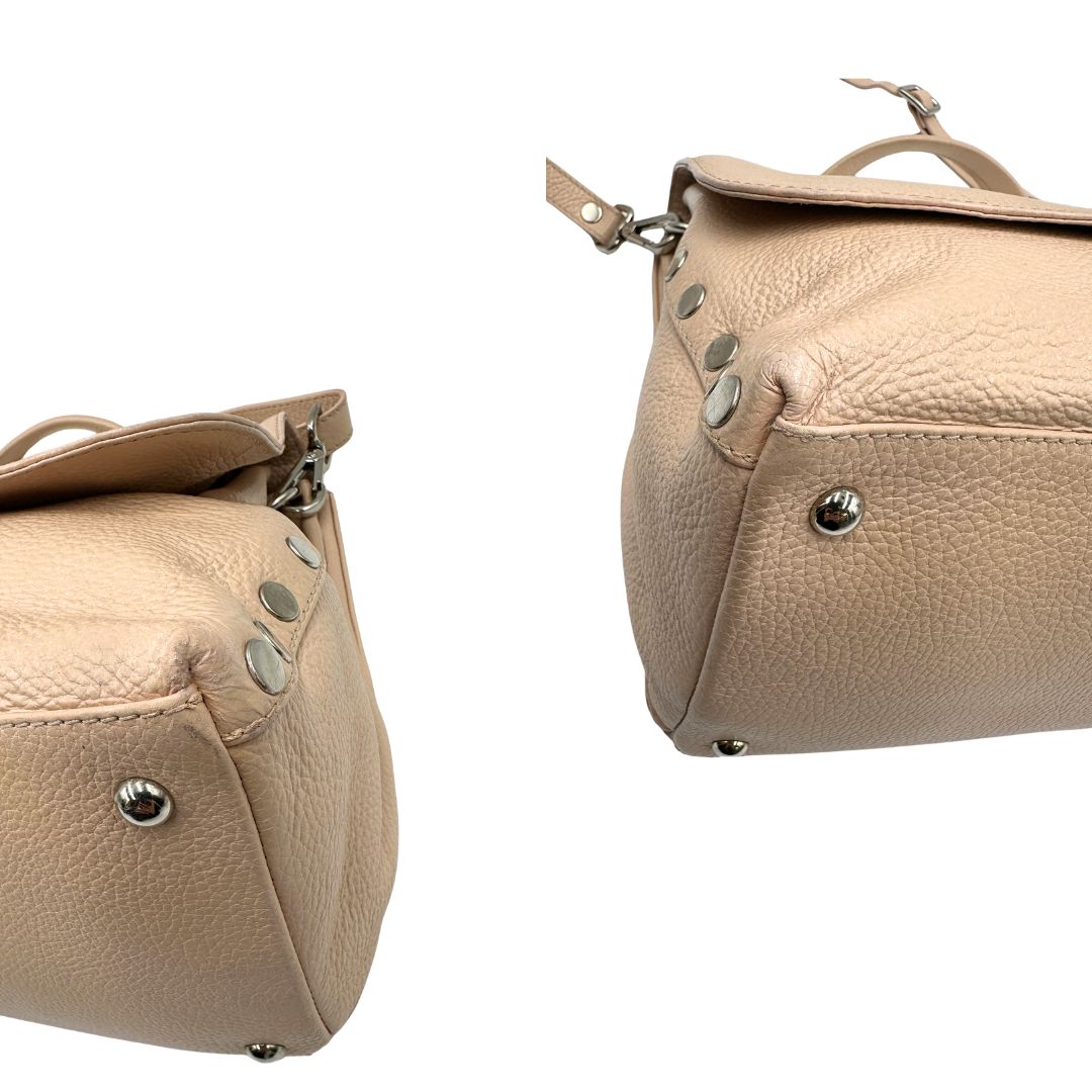 Angoli, Morbida Zanellato in pelle martellata rosa nella misura media.