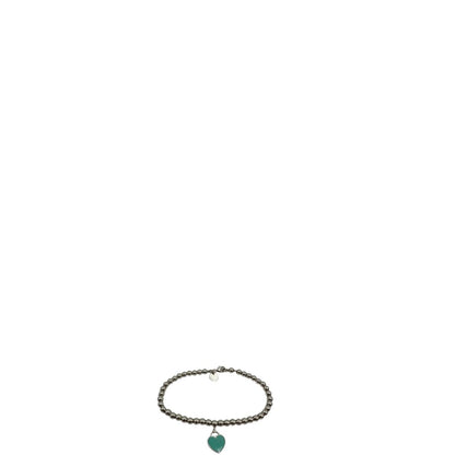 Bracciale Tiffany&Co. in argento 925 con ciondolo in argento con finitura smaltata Tiffany Blue, di lusso, originale, ottime condizioni, usato.