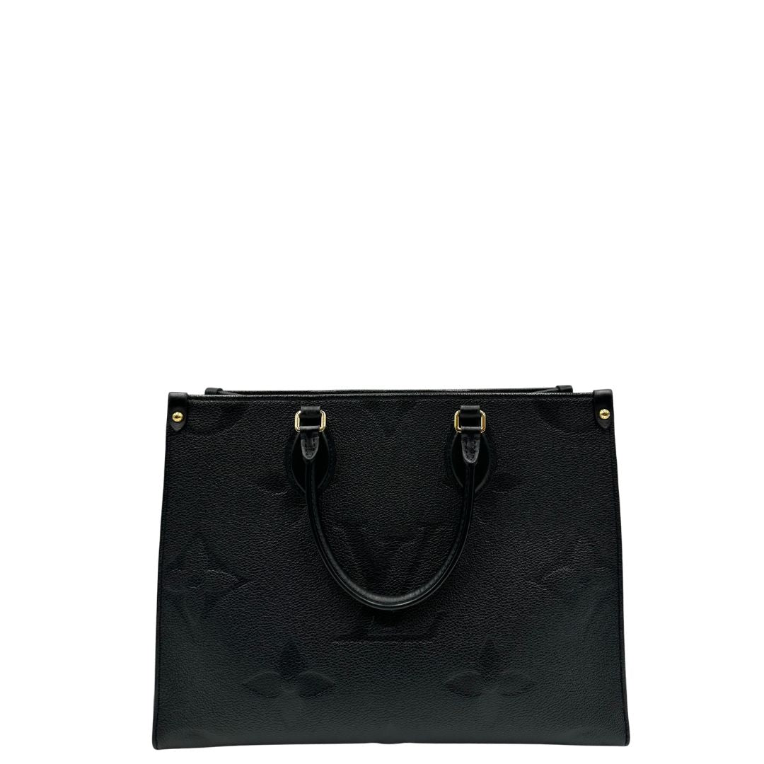 retro  Louis Vuitton OnTheGo nella versione MM in morbida pelle monogram Empreinte, di lusso, originale, ottime condizioni, usata. 