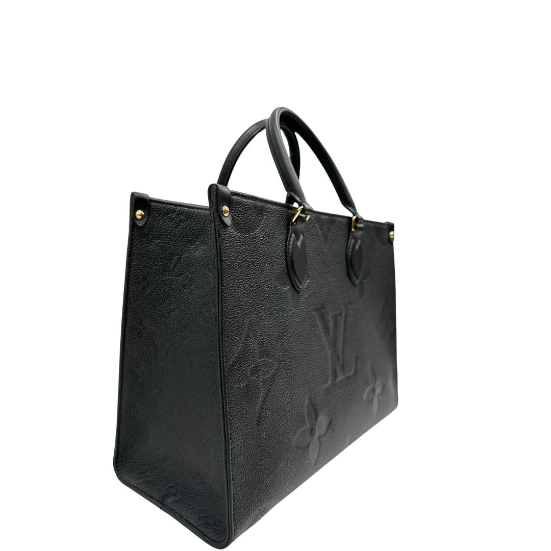 lato  Louis Vuitton OnTheGo nella versione MM in morbida pelle monogram Empreinte, di lusso, originale, ottime condizioni, usata. 