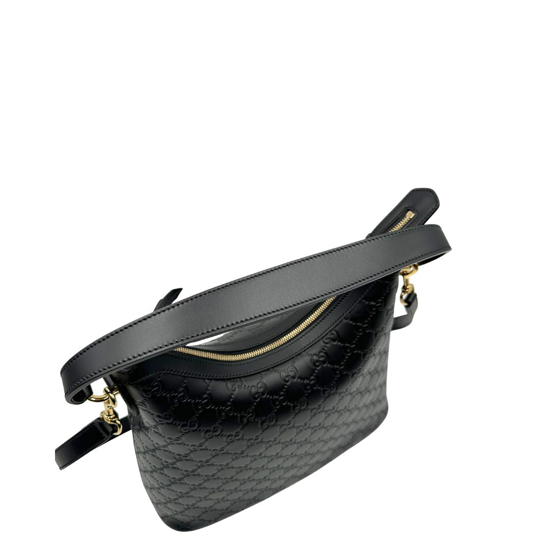 Manico, Borsa Gucci in pelle nera GG con hardware dorato. Originale, usata, di lusso, in condizioni eccellenti.