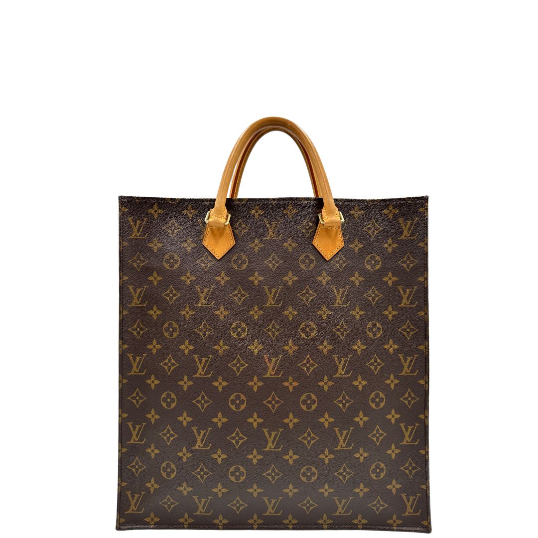 fro nt Louis Vuitton Sac Plat in tela monogram con doppi manici in vacchetta naturale, di lusso, originale, ottime condizioni, usata. 