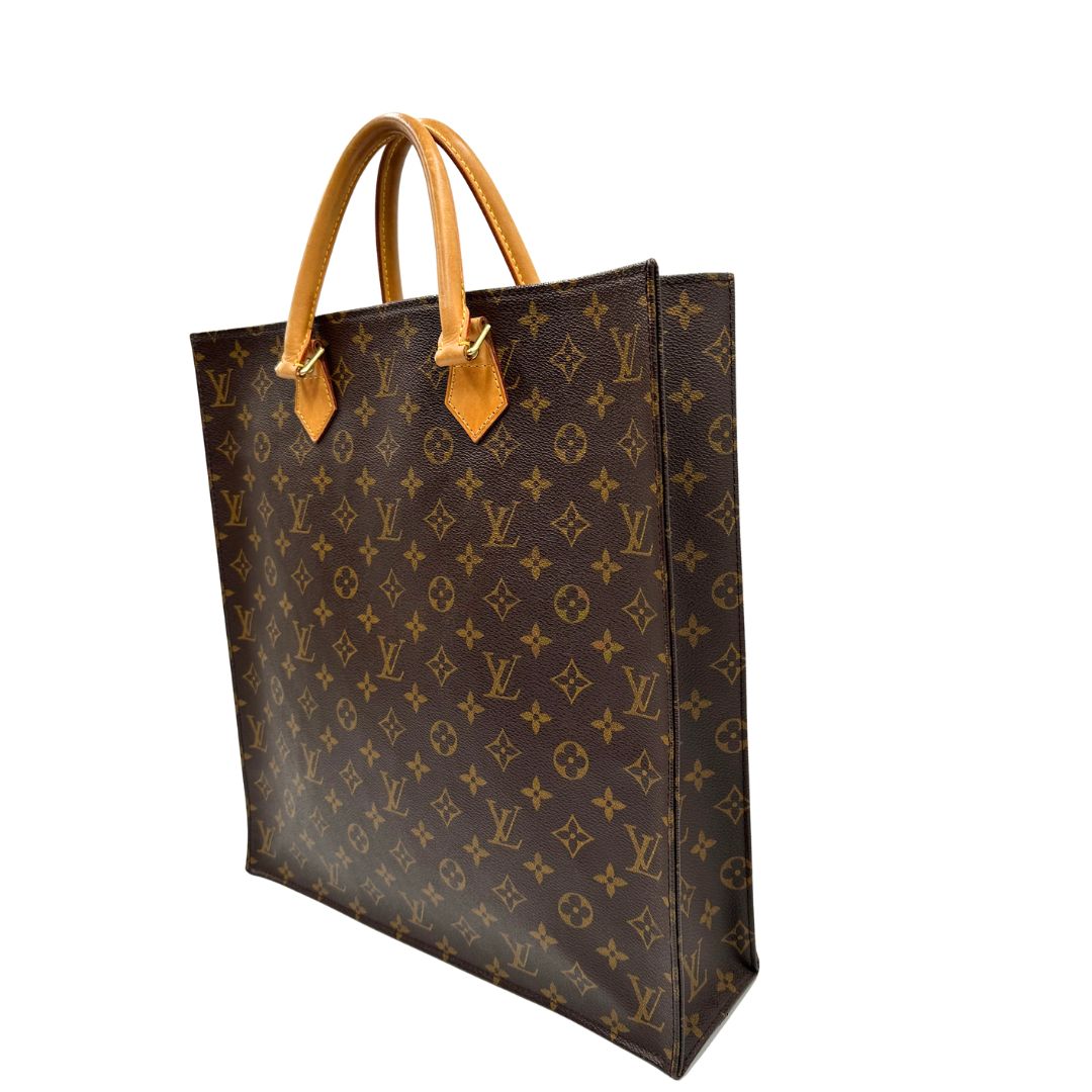 lato Louis Vuitton Sac Plat in tela monogram con doppi manici in vacchetta naturale, di lusso, originale, ottime condizioni, usata. 