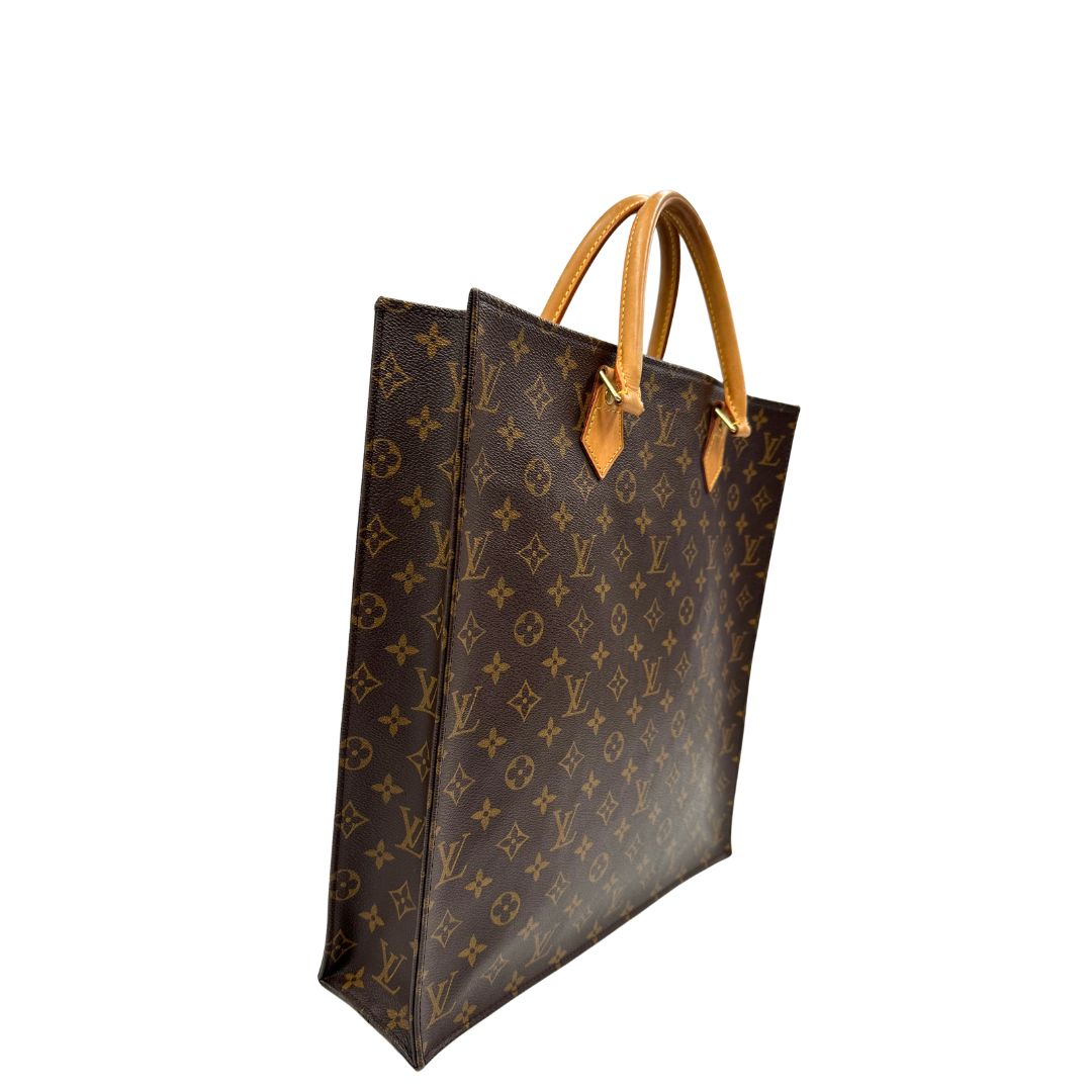 lato Louis Vuitton Sac Plat in tela monogram con doppi manici in vacchetta naturale, di lusso, originale, ottime condizioni, usata. 