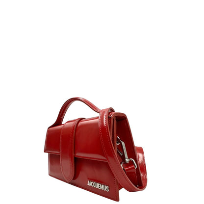 lato Borsa Jacquemus nella versione Le Grand Bambino in pelle rossa verniciata, di lusso, originale, eccellenti condizioni, usata. 