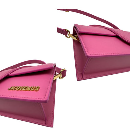 angoli  Borsa Jacquemus nella versione Le Grand Bambino neon pink, di lusso, originale, eccellenti condizioni, usata. 