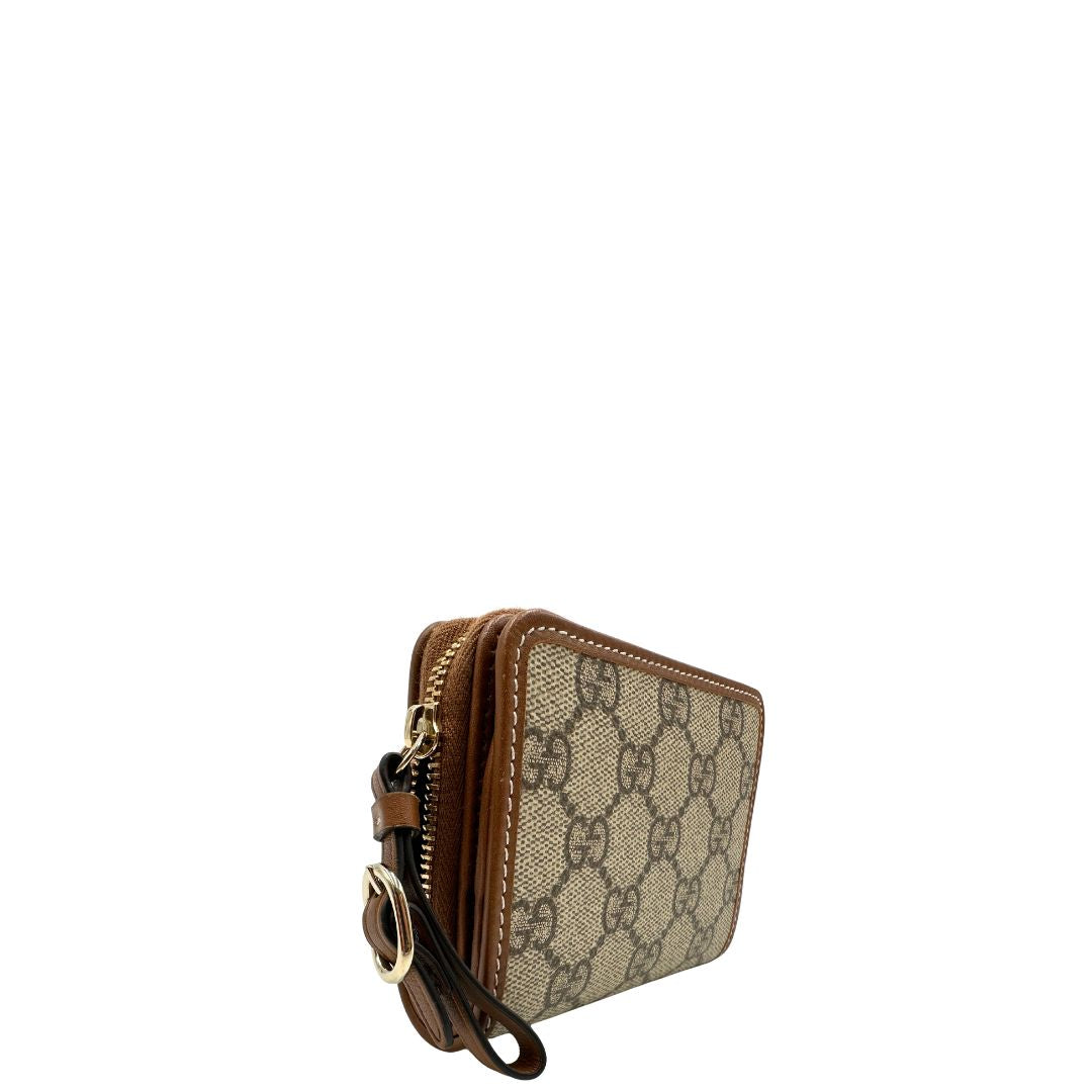 Portafoglio Gucci con trama GG Supreme, di lusso, originale, ottime condizioni, usato.