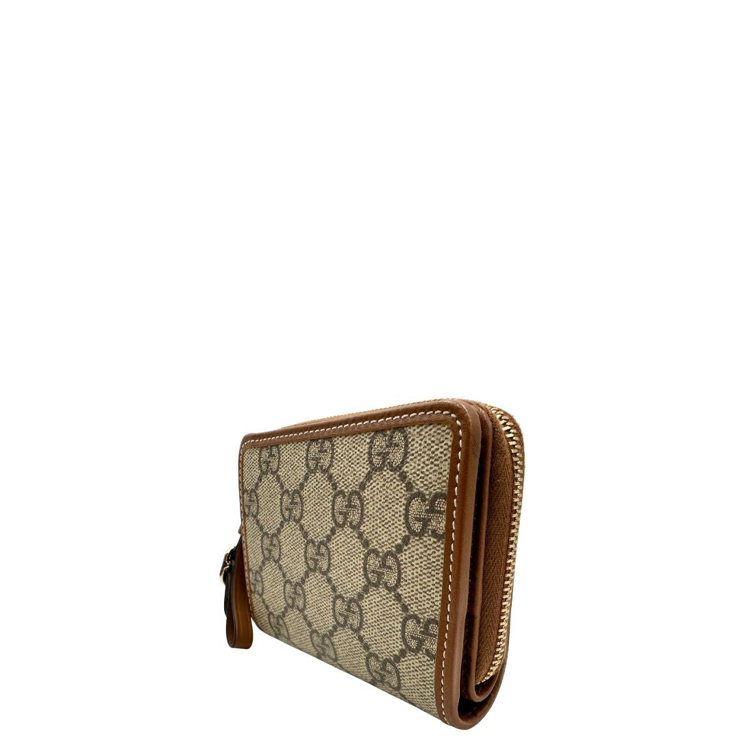 Portafoglio Gucci con trama GG Supreme, di lusso, originale, ottime condizioni, usato.