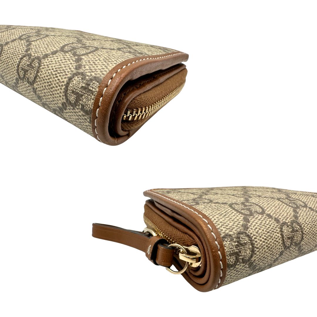 Portafoglio Gucci con trama GG Supreme, di lusso, originale, ottime condizioni, usato.