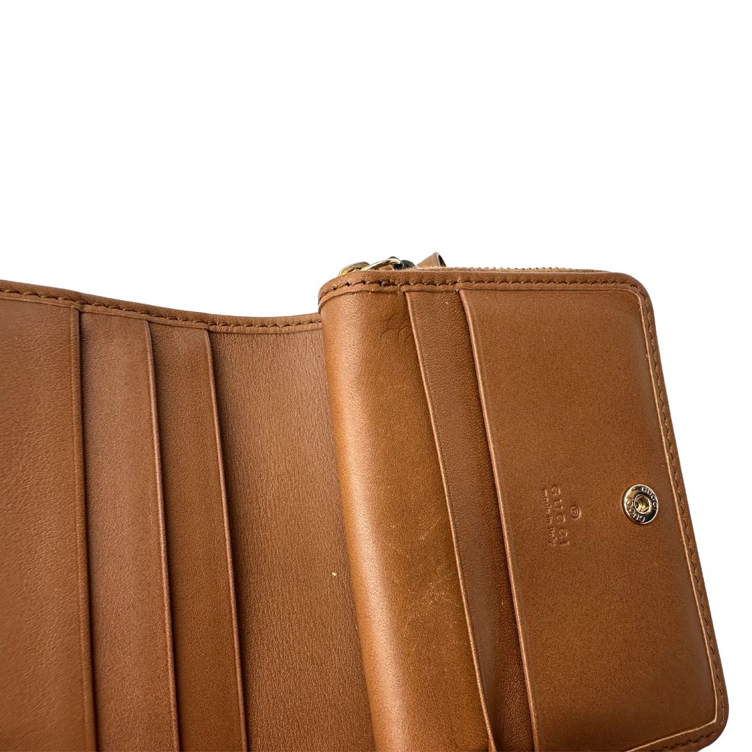 Portafoglio Gucci con trama GG Supreme, di lusso, originale, ottime condizioni, usato.