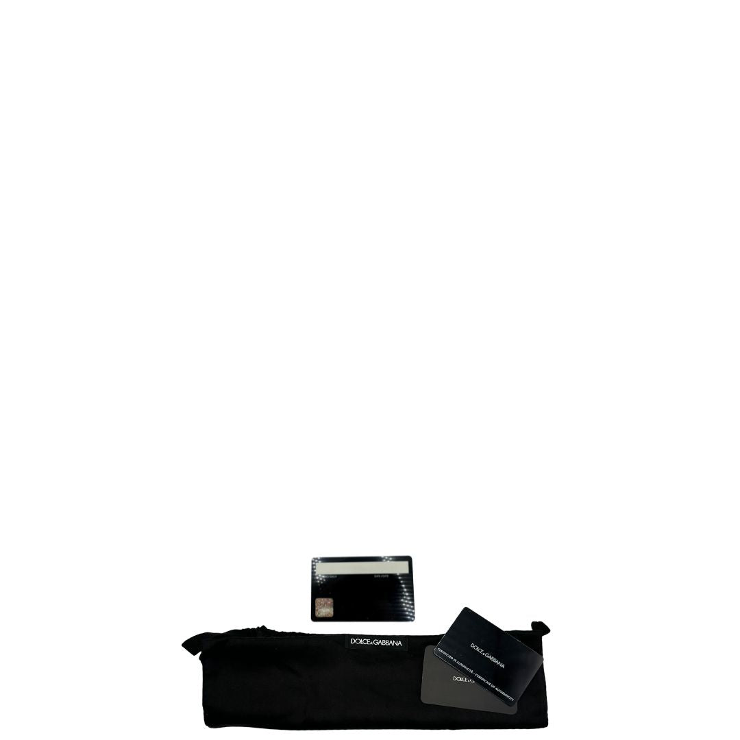 dustbag  Borsa D&G impreziosita da paillettes dorate e nere, di lusso, usata, ottime condizioni. 