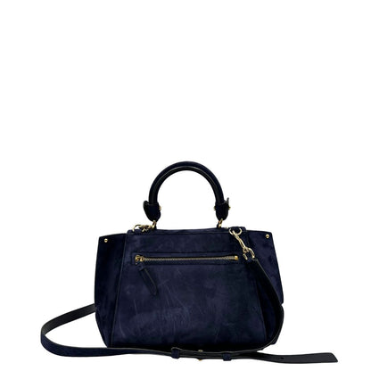 Retro, Borsa Salvatore Ferragamo realizzata in& pelle scamosciata di colore blu navy, con manico superiore e dettagli in metallo dorato.