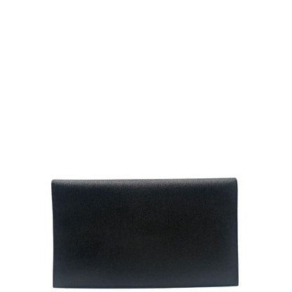 retro Pochette Saint Laurent in pelle nera martellata impreziosita dall'iconico logo Cassandre, di lusso, originale, eccellenti condizioni, usata. 
