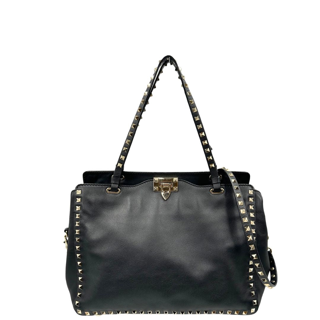 front Rockstud Valentino Garavani rifinita con borchie piramidali oro chiaro, di lusso, originale, ottime condizioni, usata. 