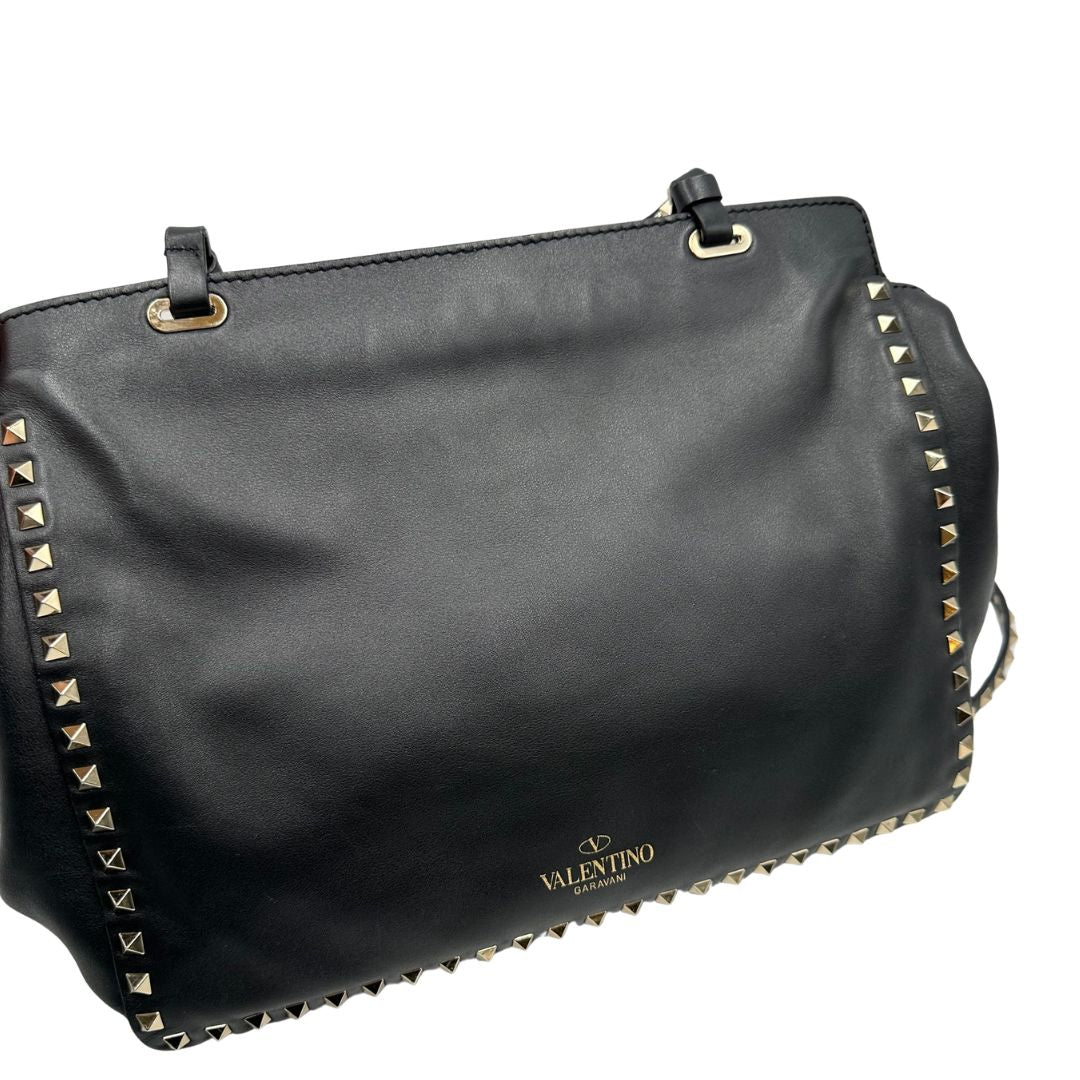 pellame Rockstud Valentino Garavani rifinita con borchie piramidali oro chiaro, di lusso, originale, ottime condizioni, usata. 