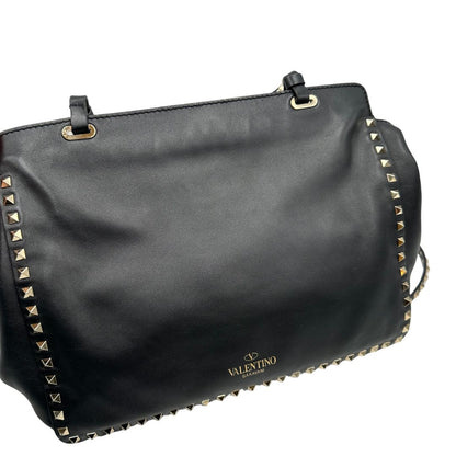 pellame Rockstud Valentino Garavani rifinita con borchie piramidali oro chiaro, di lusso, originale, ottime condizioni, usata. 