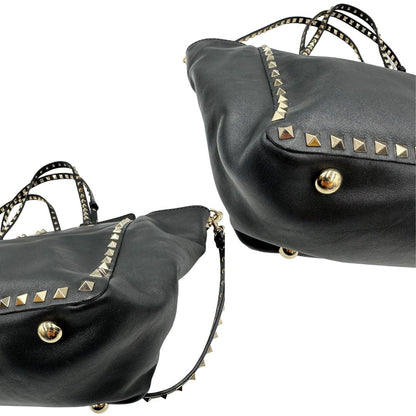 angoli Rockstud Valentino Garavani rifinita con borchie piramidali oro chiaro, di lusso, originale, ottime condizioni, usata. 