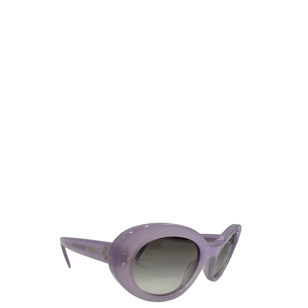 Laterale sinistro di una paio di occhiali da sole Celine tondi con lenti sfumate grigie, usati, originali, second hand, in ottime condizioni.