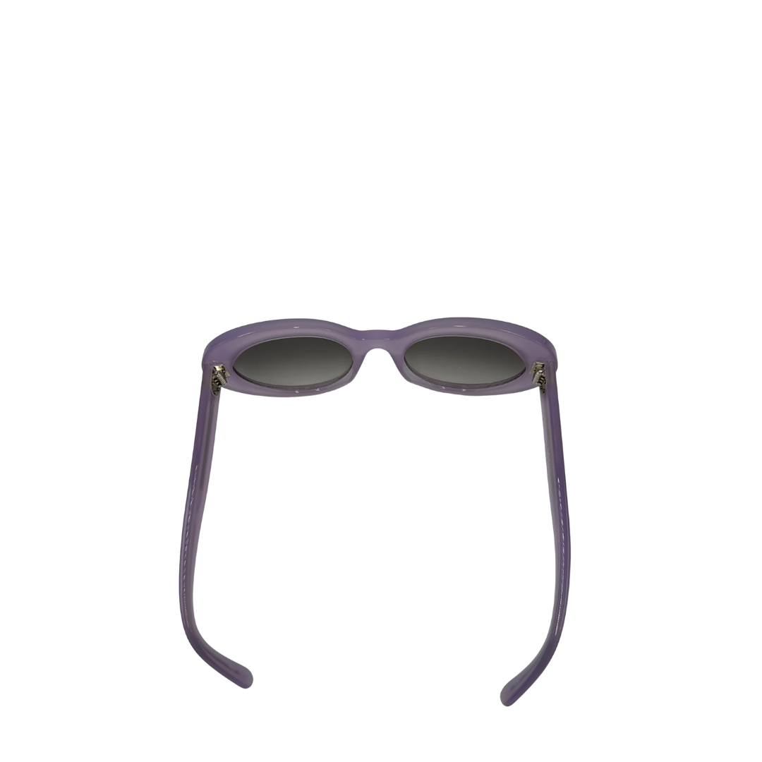 Vista superiore di una paio di occhiali da sole Celine tondi con lenti sfumate grigie, usati, originali, second hand, in ottime condizioni.