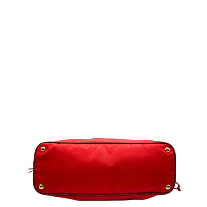 Base di una borsa Prada in nylon rosso e finiture in pelle saffiano tono su tono, usata, originale, second hand, in ottime condizioni.