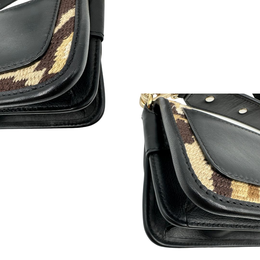 angoli  Borsa Etro in tessuto sui toni del marrone trama animalier, di lusso, originale, ottime condizioni, usata.  