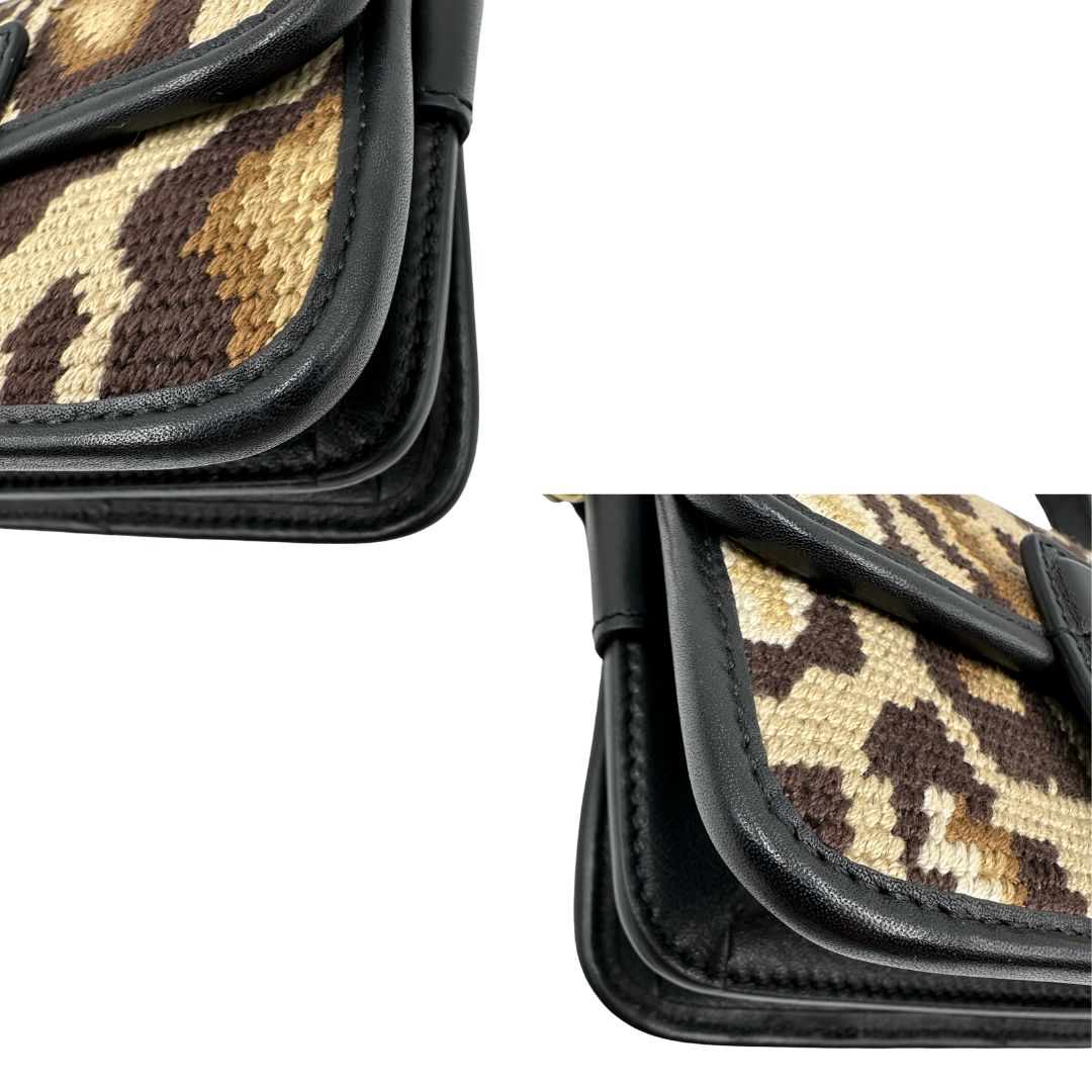 angoli  Borsa Etro in tessuto sui toni del marrone trama animalier, di lusso, originale, ottime condizioni, usata.  