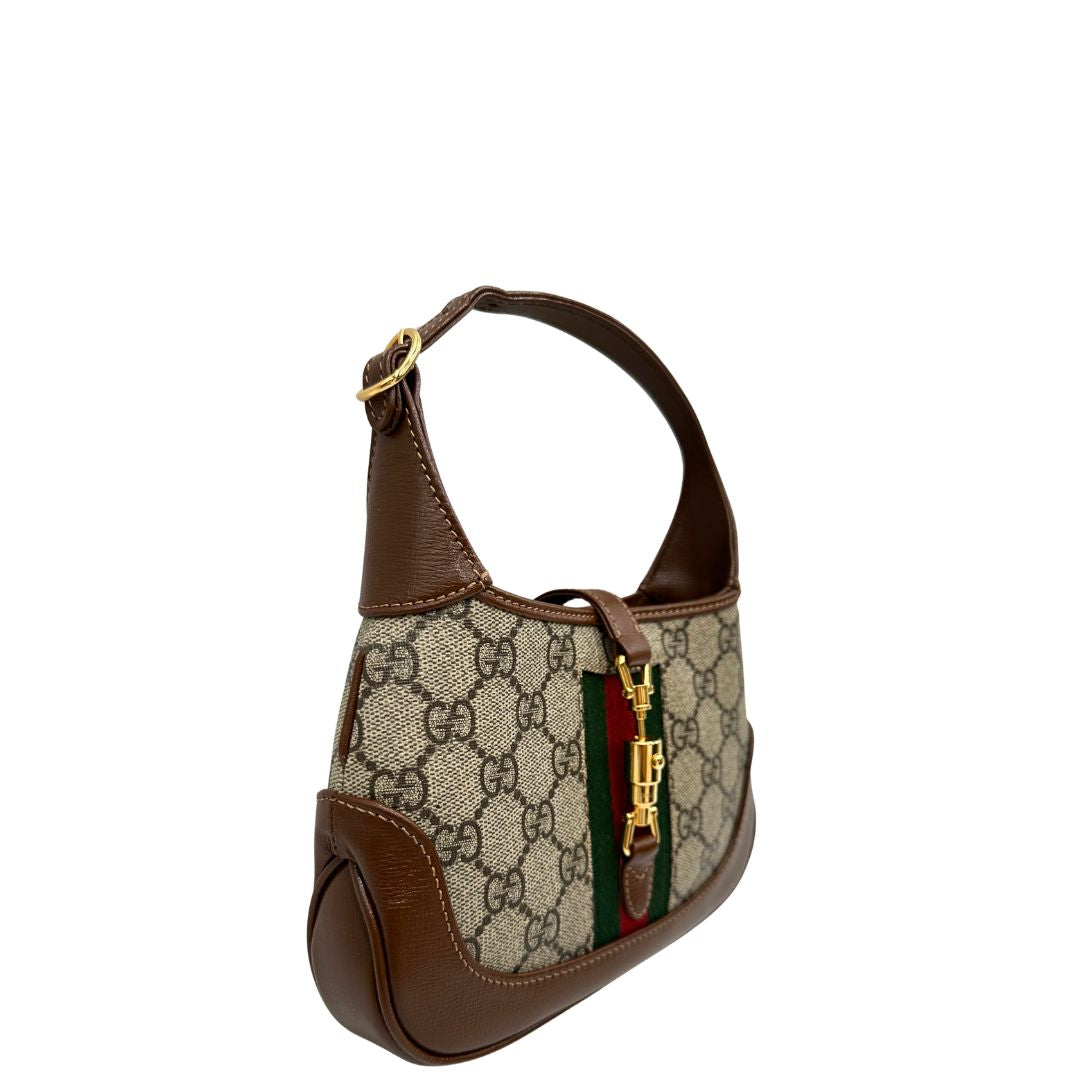 lato  Borsa Gucci Jackie in canvas GG e pelle marrone, di lusso, originale, eccellenti condizioni, usata. 