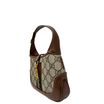 lato  Borsa Gucci Jackie in canvas GG e pelle marrone, di lusso, originale, eccellenti condizioni, usata. 