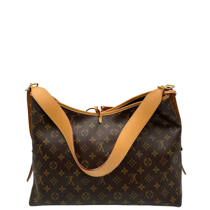 retro  La borsa CarryAll MM è realizzata in tela Monogram e rifinita in pelle naturale, di lusso, originale, ottime condizioni, usata. 