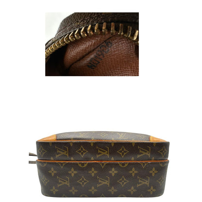 Base e codice di una borsa Nile con tracolla di LV in canvas monogrammato, usata, originale, second hand, in ottime condizioni.
