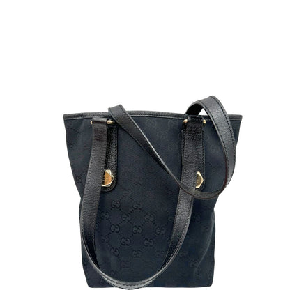 Retro di una borsa a spalla Gucci in tessuto nero trama GG, con parti metalliche dorate, usata, originale, second hand, in ottime condizioni.