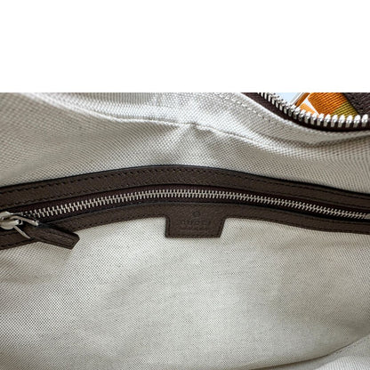 Interno, Borsa Gucci Attache in canvas beige con tracolla Web arancione e verde. Originale, usata, di lusso, in condizioni eccellenti.
