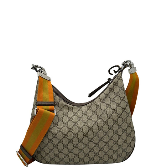 Front, Borsa Gucci Attache in canvas beige con tracolla Web arancione e verde. Originale, usata, di lusso, in condizioni eccellenti.