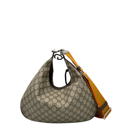 Front, Borsa Gucci Attache in canvas beige con tracolla Web arancione e verde. Originale, usata, di lusso, in condizioni eccellenti.