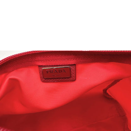 Interno, Necessaire Prada in tessuto Vela rosso e hardware argentato. Originale, usata, di lusso, in ottime condizioni.