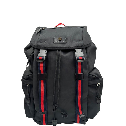 Front di uno zaino Gucci in tessuto nero e bretelle Web blu e rosso, usato, originale, second hand, in condizioni eccellenti.