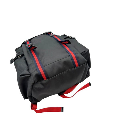 Base di uno zaino Gucci in tessuto nero e bretelle Web blu e rosso, usato, originale, second hand, in condizioni eccellenti.