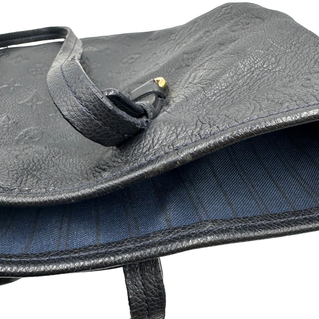 Borsa Louis Vuitton in pelle blu monogram empreinte, di lusso, originale, ottime condizioni, usata.