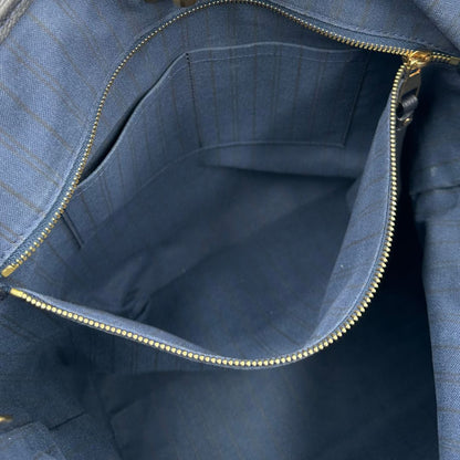 Borsa Louis Vuitton in pelle blu monogram empreinte, di lusso, originale, ottime condizioni, usata.
